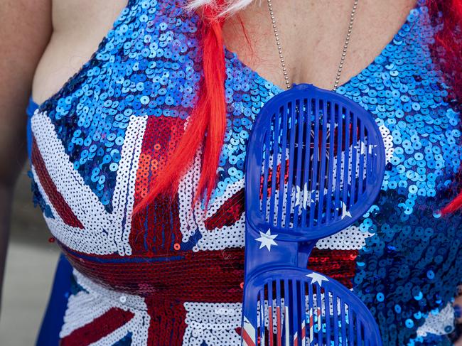 SYDNEY, AUSTRALIA - JANUARY 26: A woman dressed in an Australia Day outfit poses for a portrait at the Museum of Contemporary Art in Circular Quay on January 26, 2021 in Sydney, Australia.  Australia Day, formerly known as Foundation Day, is the official national day of Australia and is celebrated annually on January 26 to commemorate the arrival of the First Fleet to Sydney in 1788. Indigenous Australians refer to the day as 'Invasion Day' and there is growing support to change the date to one which can be celebrated by all Australians. (Photo by Jenny Evans/Getty Images)