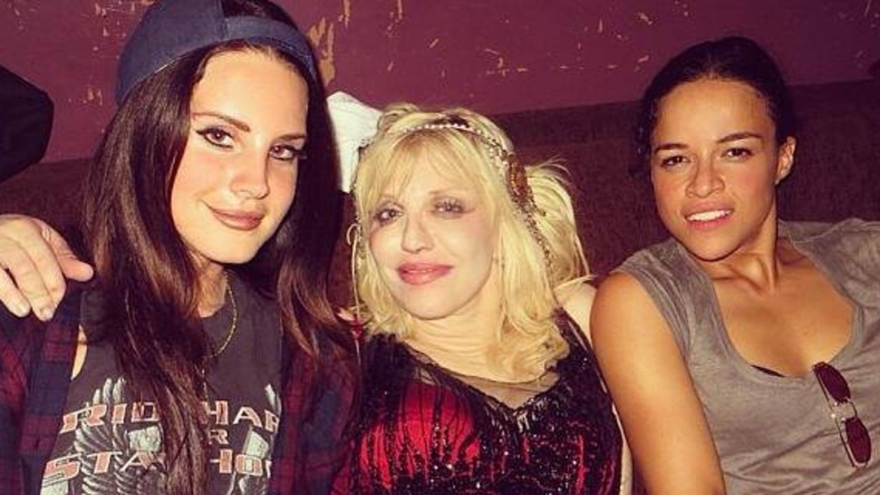 Love hangs with Del Rey and Michelle Rodriguez (right) in 2013.
