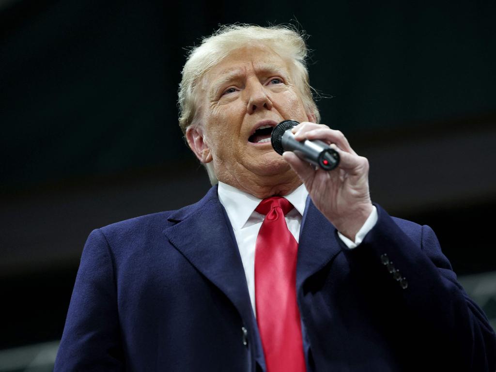 Former US president Donald Trump speaks to voters during a visit to a caucus site at the Horizon Event Centre in Clive, Iowa. Picture: Getty Images