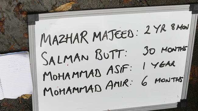 A media whiteboard showing the prison terms given to cricket agent Mazhar Majeed and former Pakistan cricketers Salman Butt, Mohammad Asif and Mohammad Amir in London, November 2011. Picture: AP Photo/Kirsty Wigglesworth