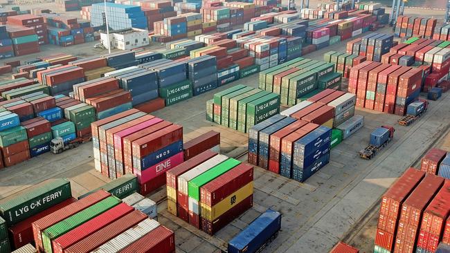 Even though ports are “open” there are huge delays due to no workers or the need to divert goods. Picture: AFP / China OUT