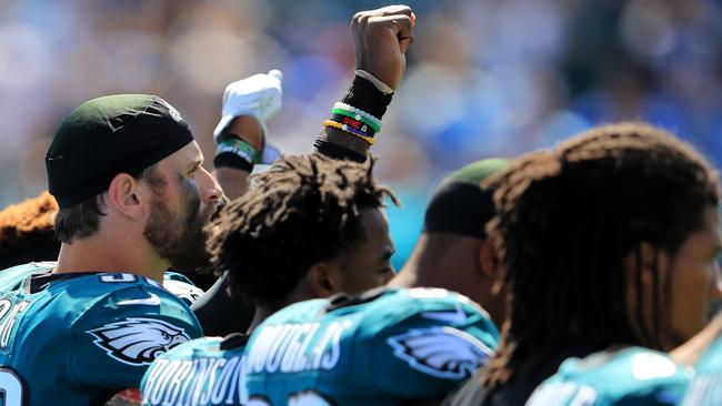 Malcolm Jenkins of the Philadelphia Eagles holds up a fist during the national anthem. Picture: Getty Images