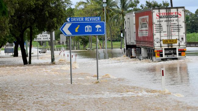 Sunday February 9. Heavy rain causes flooding in North Queensland. Flooding at Plantation Creek in Ayr cuts Bruce Highway to traffic apart from trucks. Picture: Evan Morgan