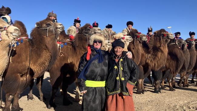 Townsville man Paddy McHugh is helping to bring camel racing to the Olympics and is set to stage part of a World Series Camel Racing event in Australia this year and next. Paddy McHugh in Mongolia with two hump camels. Picture: Supplied