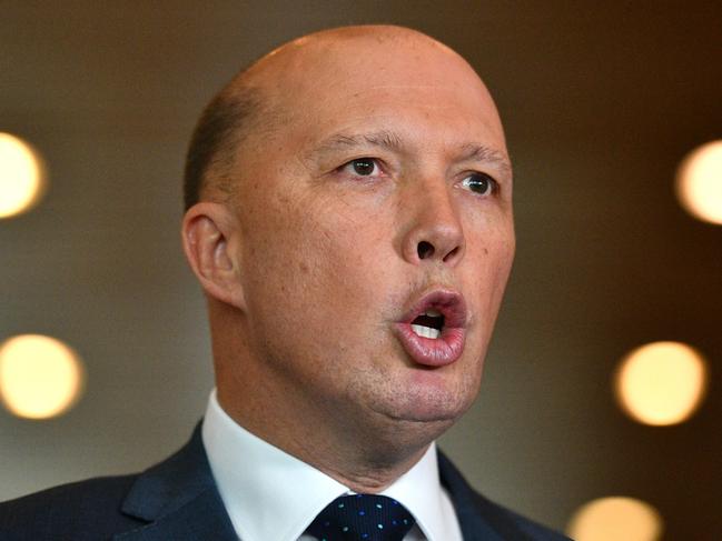 Minister for Home Affairs Peter Dutton at a press conference at Parliament House in Canberra, Thursday, May 24, 2018. (AAP Image/Mick Tsikas) NO ARCHIVING