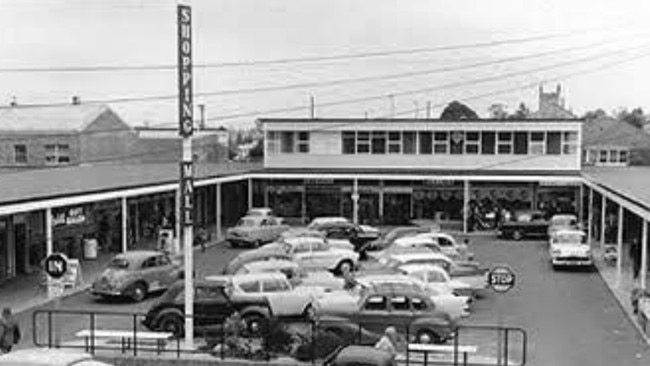 Wentworthville Mall in 1962 when an electrical shop was on the left and the TAB on the right of the carpark.