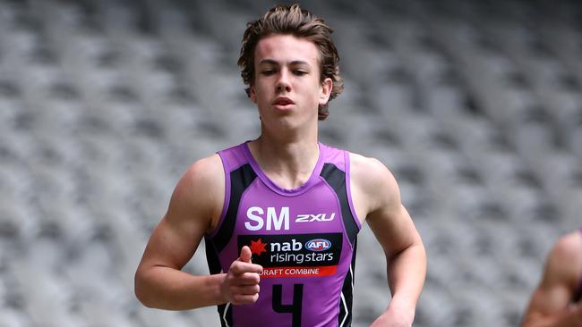 Callum Brown competes in the 3km time-trial at the AFL Draft Combine.