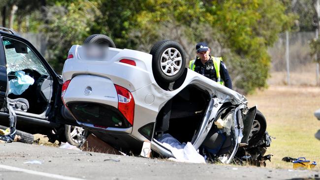 A car flipped on its roof in a deadly crash at Yabulu. Picture: Alix Sweeney