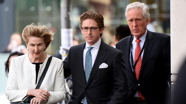 Sandy Dawson (centre) arrives with his mother Jane Dawson and father Sandy Dawson at the Lindt Cafe siege inquest in March 2016. His sister Katrina was killed by police bullets when officers stormed the cafe. Picture: AAP Image/Dean Lewins