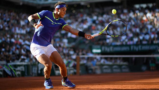 Spain's Rafael Nadal returns the ball to Austria's Dominic Thiem.