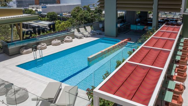 Best hotels in Cairns13. Crystalbrook BaileyThis 12 storey hotel is one of three Crystalbrook hotels that makes up the Cairns city skyline and is set apart by its celebration of the arts.Why we love it: each of its 217 rooms comes complete with local and Indigenous artworks - and if that wasn’t enough, larger-than-life murals and a baby grand piano painted by Indigenous artist Natasha Davui welcome you in the lobby.What to consider: the pool is better at Crystalbrook Flynn.What features does Crystalbrook Bailey have?The Bailey offers a wide range of rooms to suit various party sizes, including a 50 metre square Family Urban that sleeps up to four adults, and a luxurious three bedroom residence that can accommodate up to six.There are dog-friendly rooms.Pachamama is one of the city's best rooftop bars.What to know: when you join the Crystalbrook Crowd loyalty program, you immediately score a 10 per cent discount on not just accommodation but restaurants and bars too.Book at Escape Deals