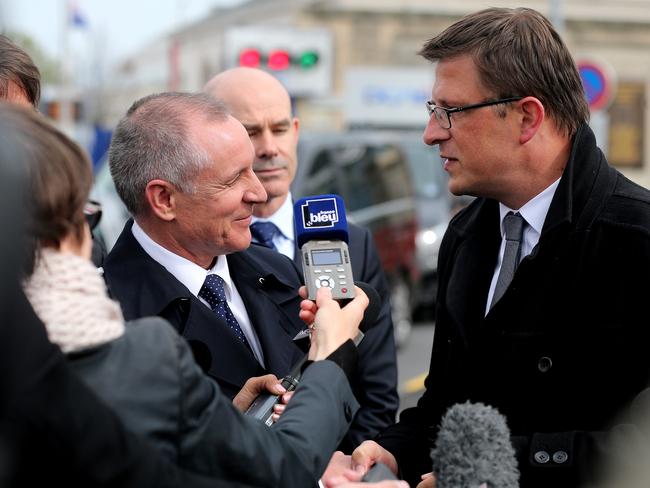 Premier Jay Weatherill is greeted by the Mayor of Cherbourg Benoit Arrive. Picture: Calum Robertson