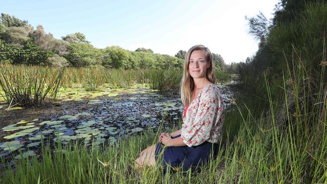 Rosalinde Brinkman, 24, works and volunteers for over 40 different local communities to improve and preserve natural areas on the Gold Coast. Photo: Glenn Hampson