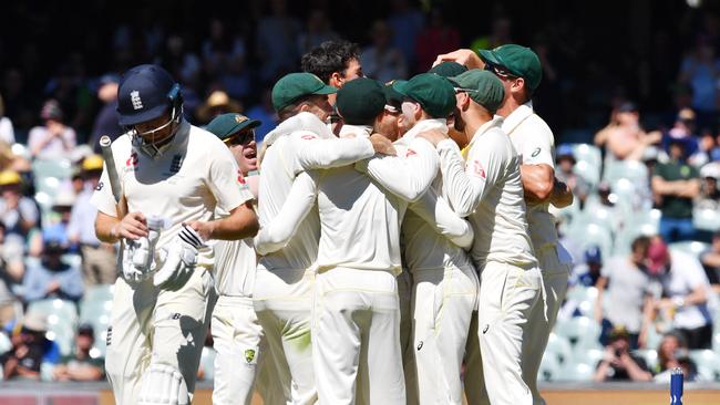 Australian players celebrate after winning the second Test.