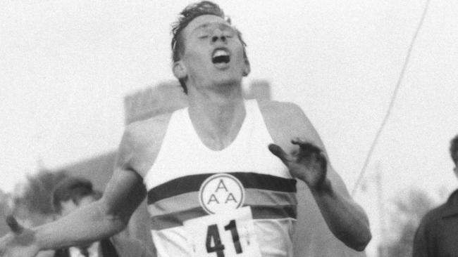 Britain's Roger Bannister hits the tape to break the four-minute mile in Oxford, England. Picture: AP