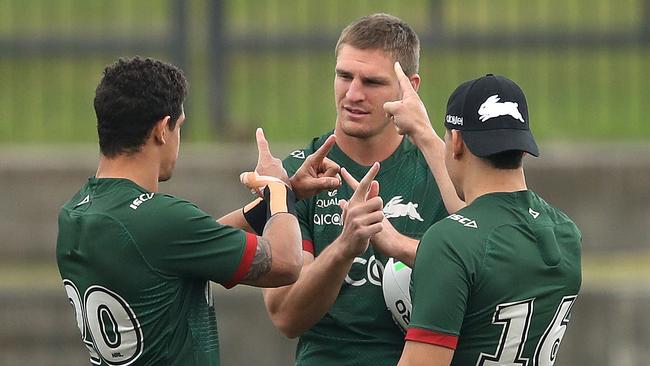 Jed Cartwright gets some words of advice from Dane Gagai and Cody Walker.