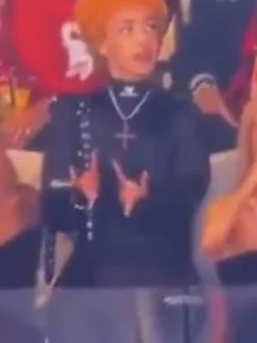 Viewers also noticed her upside-down cross necklace. Picture: NFL/X