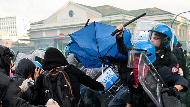 Police clash with protestoes in Rome on Saturday. Picture: AFP