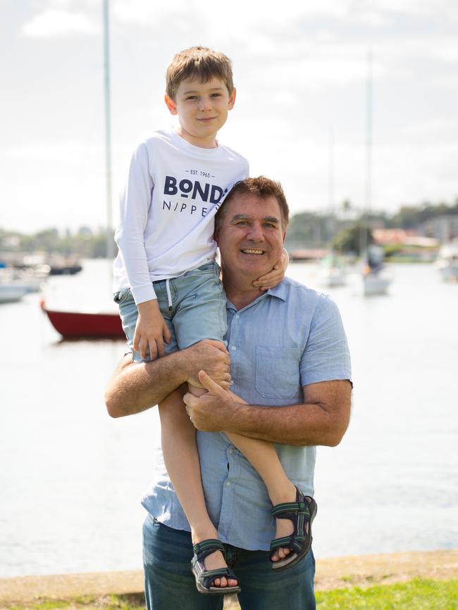 Karl Nixon, 59, with son Liam, 8. Picture: Michael Bilbe-Taylor / The Australian