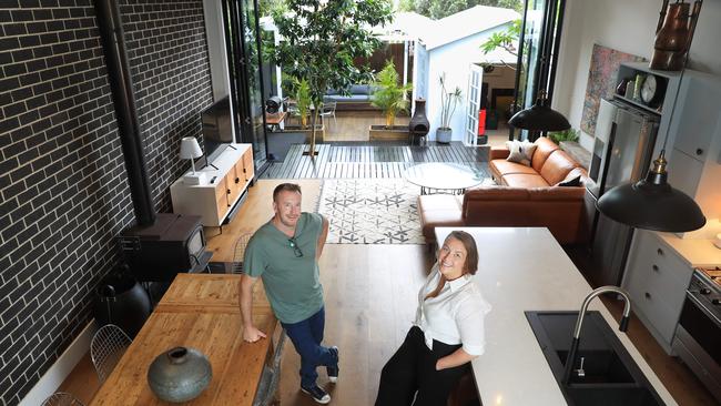 Adam and Clare Griffith in their Newtown cottage. Picture: John Feder