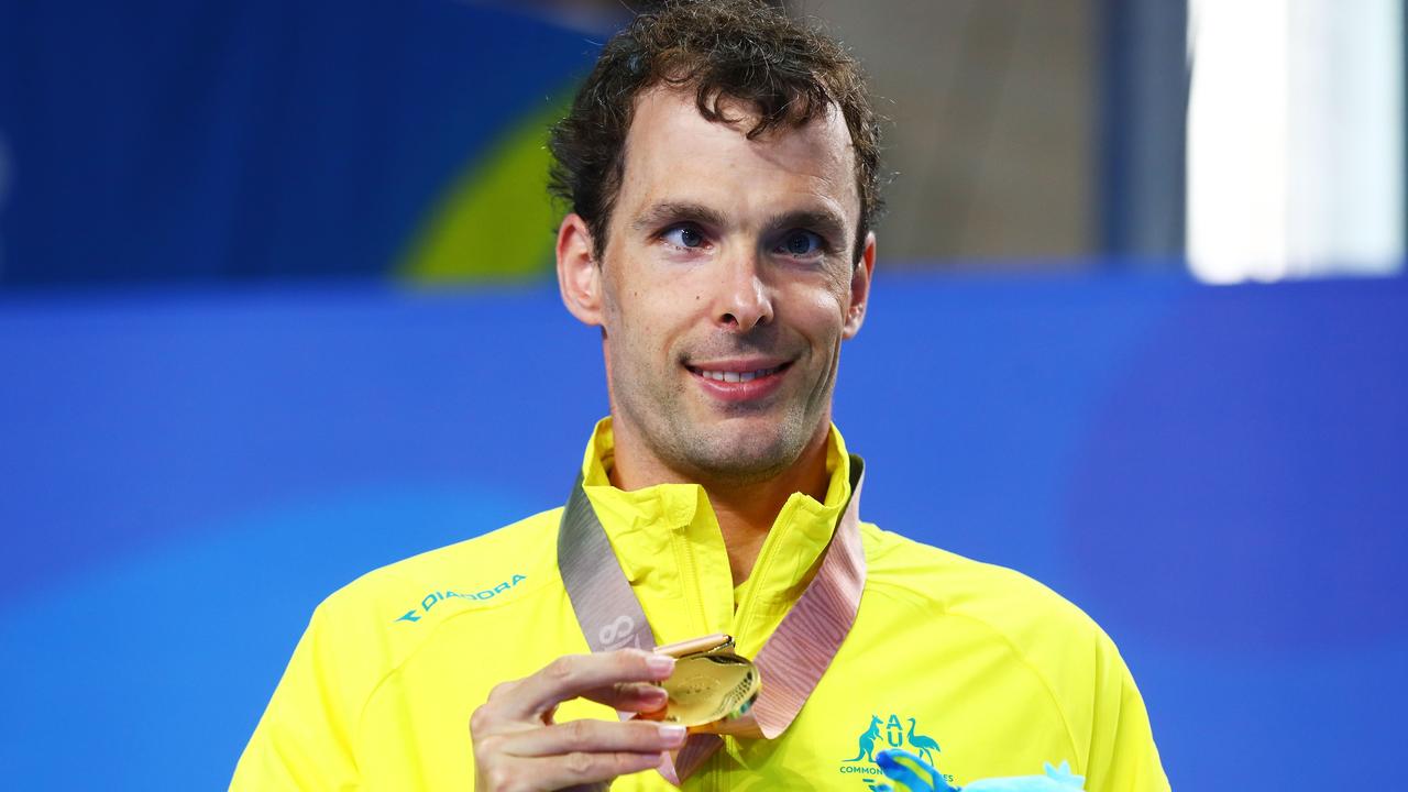 Matt Levy shows off his Commonwealth Games gold medal.