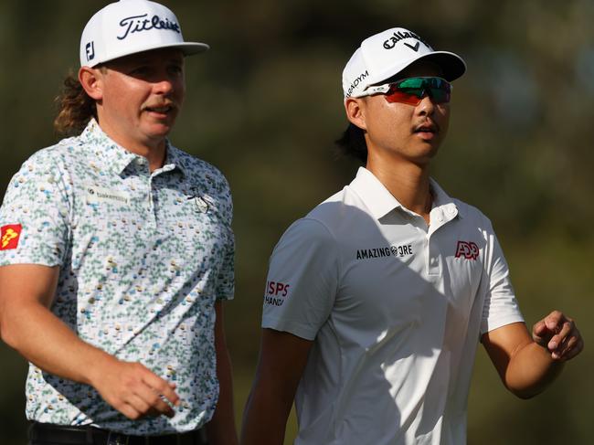 SYDNEY, AUSTRALIA - NOVEMBER 30: Min Woo Lee of Australia looks on alongside Cameron Smith of Australia on the 13th hole during the ISPS HANDA Australian Open at The Lakes Golf Club on November 30, 2023 in Sydney, Australia. (Photo by Mark Metcalfe/Getty Images)