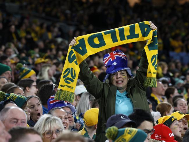 DAILY TELEGRAPH AUGUST 7, 2023. Fans celebrate an Australian goal at the FIFA Womens World Cup Australia V Denmark knockout game at Stadium Australia, Sydney Olympic Park. Picture: Jonathan Ng