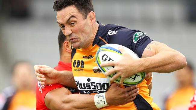 WOLLONGONG, AUSTRALIA - MARCH 06: Cadeyrn Neville of the Brumbies is tackled during the round six Super Rugby match between the Sunwolves and the Brumbies at WIN Stadium on March 06, 2020 in Wollongong, Australia. (Photo by Mark Kolbe/Getty Images)