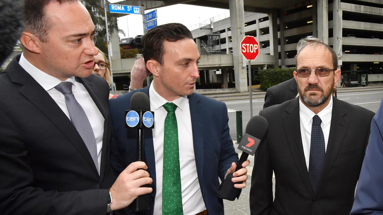 Craig Maudsley (right) arriving at Brisbane Magistrates Court in 2017, facing a charge of misconduct in public office following a Crime and Corruption Commission investigation. Picture: Darren England