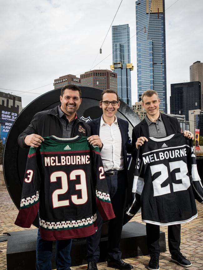 Former NHL players Darcy Hordichuk and Dustin Brown pose with Minister for Victorian Tourism, Sport and Major Events Steve Dimopoulos. Picture: Getty Images