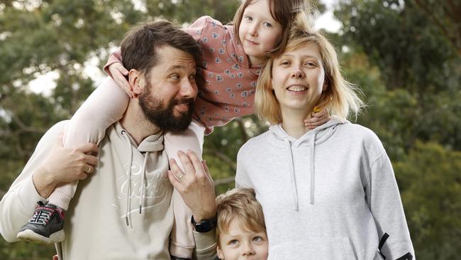 Ukrainian refugees Inna Seledkova with her husband Danyl Seledkov and their son, Elijah Seledkov, 7, and daughter Amilia Seledkova, 4, at Strathfield Park. Picture: Jonathan Ng