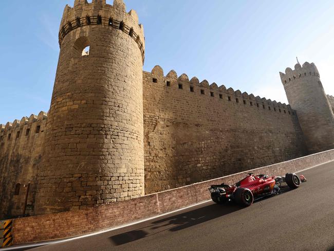 TOPSHOT - Ferrari's Monegasque driver Charles Leclerc steers his car during the qualifying session for the Formula One Azerbaijan Grand Prix at the Baku City Circuit in Baku on April 28, 2023. (Photo by Giuseppe CACACE / AFP)