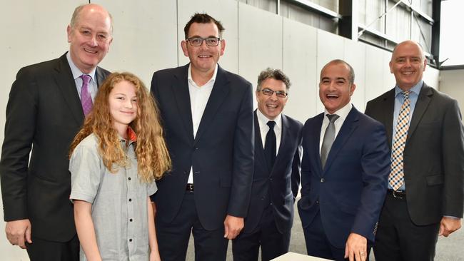 Mr Simpson (right) with Premier Daniel Andrews and Education Minister James Merlino at the opening of Richmond High School.