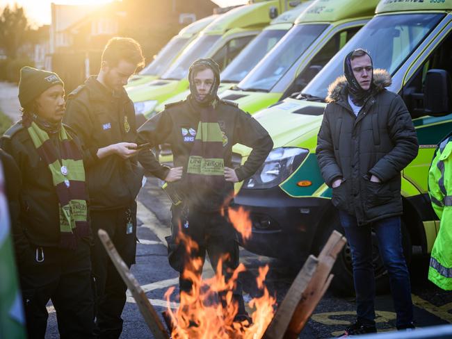 Ambulance workers and supporters gather outside Kenton Ambulance Station during a strike over pay and conditions in London. Picture: Leon Neal/Getty Images
