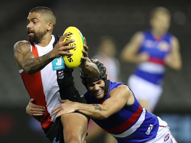 AFL Round 2. St Kilda v Western Bulldogs at Marvel Stadium, Docklands. 14/06/2020.  Bradley Hill of the Saints tries to break the Caleb Daniel of the Bulldogs tackle   . Pic: Michael Klein