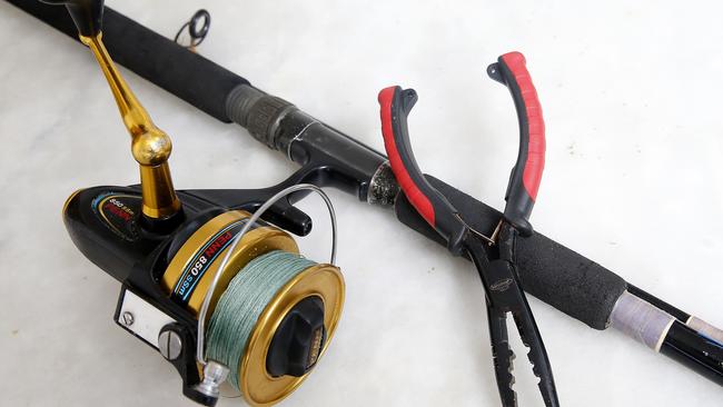 Fishing rod and pliers. Picture: John Appleyard