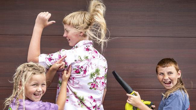 South coast boy Lincon Crane getting his mullet styled by his brother. Picture: Darren Leigh Roberts