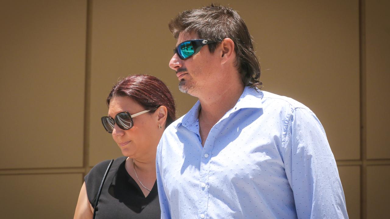 Michael 'Pelican' MAKRYLOS with wife Christina MAKRYLOS leave the NT Supreme Court after giving evidence in the trial of alleged Darwin shooter Benjamin Hoffmann. Picture: Glenn Campbell