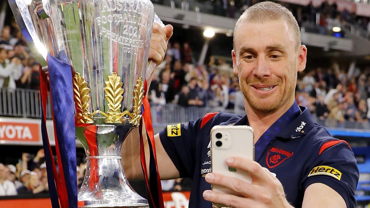 Simon Goodwin FaceTimes with the Premiership Cup. Picture: Getty Images