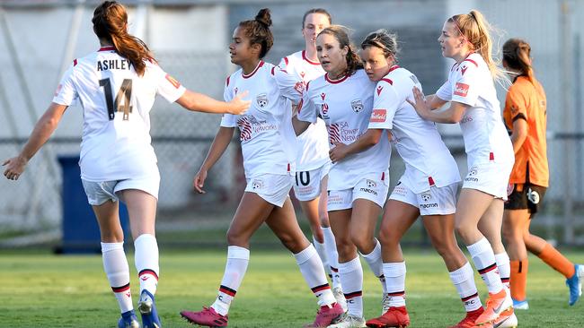 Adelaide United celebrates Mallory Weber’s equaliser against Brisbane Roar. Picture: Bradley Kanaris/Getty Images