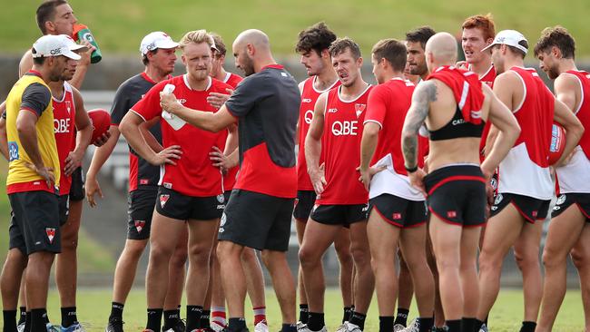 Swans development coach Tadhg Kennelly talks to players. Picture: Cameron Spencer/Getty