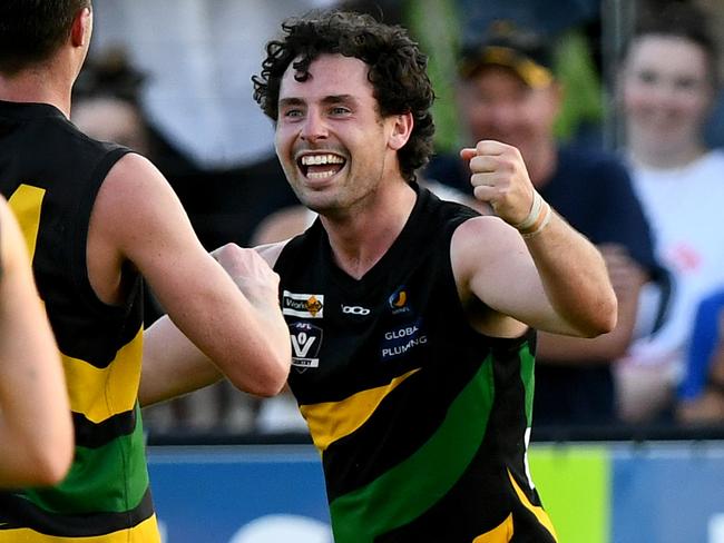 Ethan Johnstone of the Tigers is congratulated by team mates after kicking a goal during the 2023 MPFNL Division One Seniors Grand Final match between Dromana and Frankston YCW at Frankston Park in Frankston, Victoria on September 17, 2023. (Photo by Josh Chadwick)