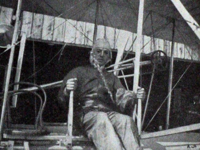 Pioneer aviator Colin Defries at the controls of his Wright Flyer.