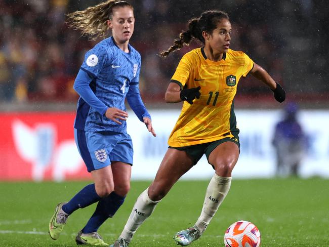 Mary Fowler and Keira Walsh in the most recent match-up between Australia and England in April. Picture: Ryan Pierse/Getty Images