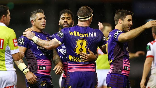 2016: Broncos players celebrate winning the round 22 NRL match between the St George Illawarra Dragons and the Brisbane Broncos at WIN Stadium.