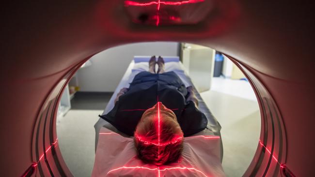 Person undergoing a CAT scan in hospital. PET scan equipment. Medical CT scan of patient. Picture: iStock