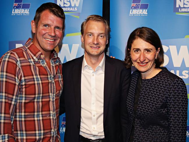Former premier Mike Baird and Premier Gladys Berejiklian congratulate Mr Griffin. Adam Yip/ The Manly Daily