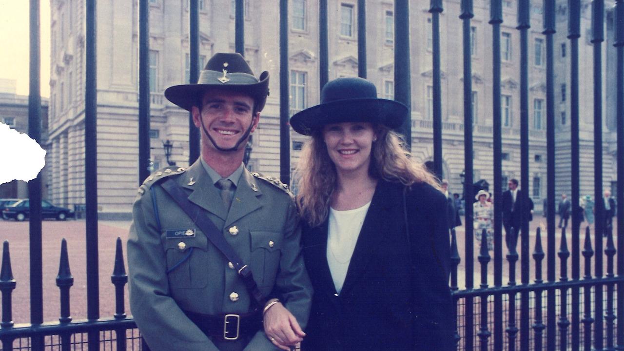 Matthew Opie with his wife, Susan, when they met Queen Elizabeth II at Buckingham Palace. Picture: Supplied