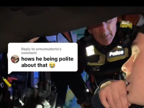 A police officer has been captured on film delivering an extraordinary spray to two men over an idiotic road act. Picture: Tiktok
