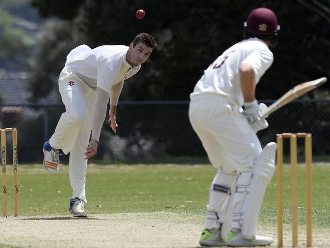 Kieran Elliot sends one down. Picture: Andy Brownbill